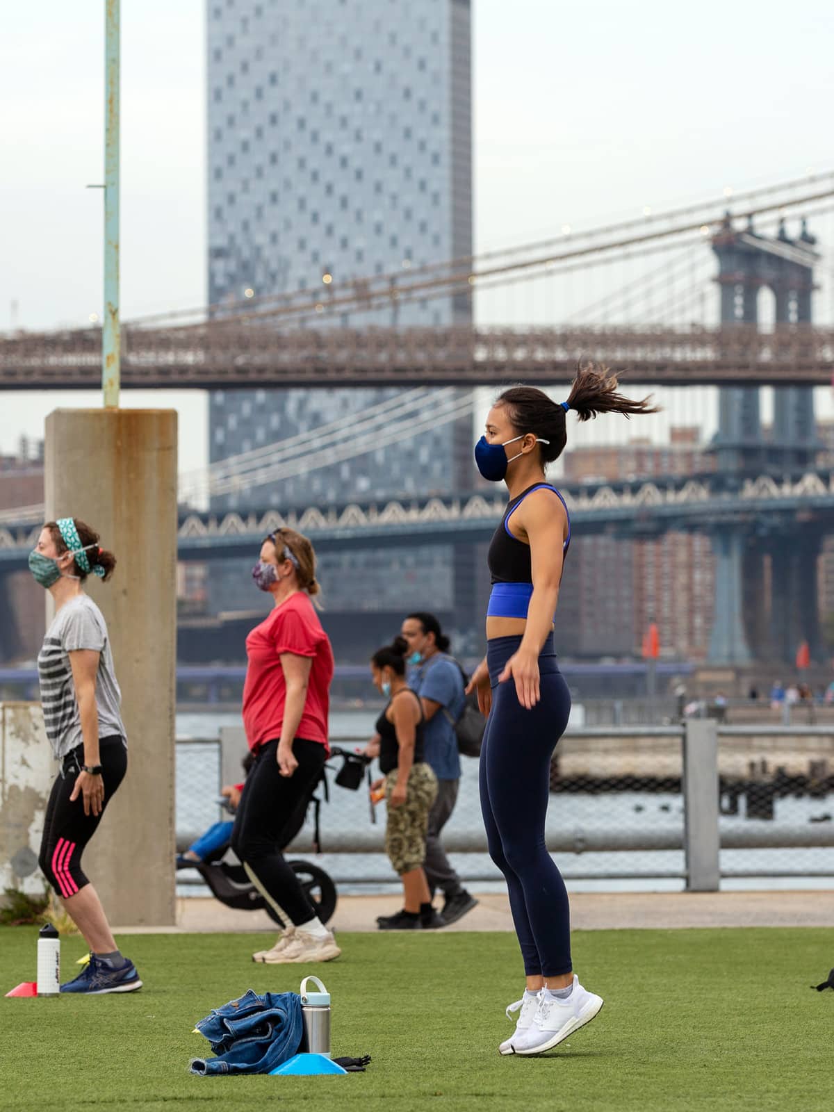 People jumping on the Pier 2 Play Turf.