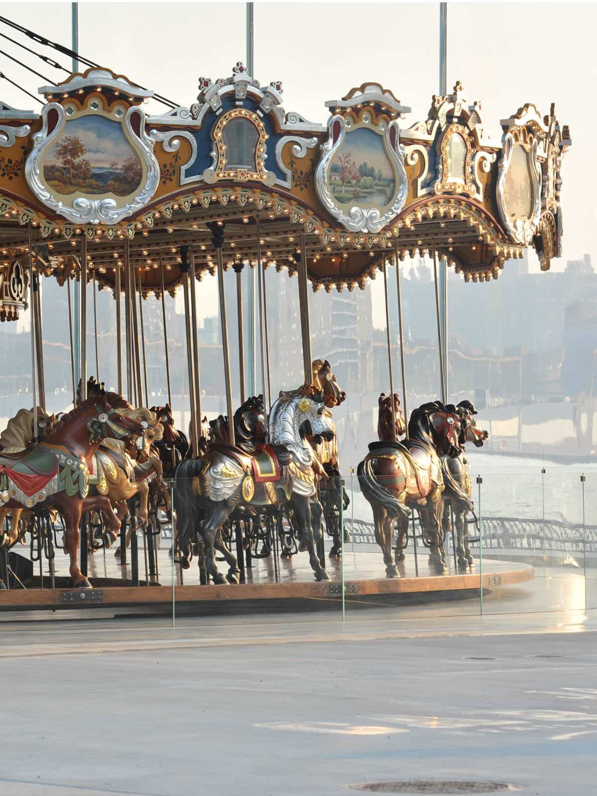 Horses on Jane's Carousel at sunset.