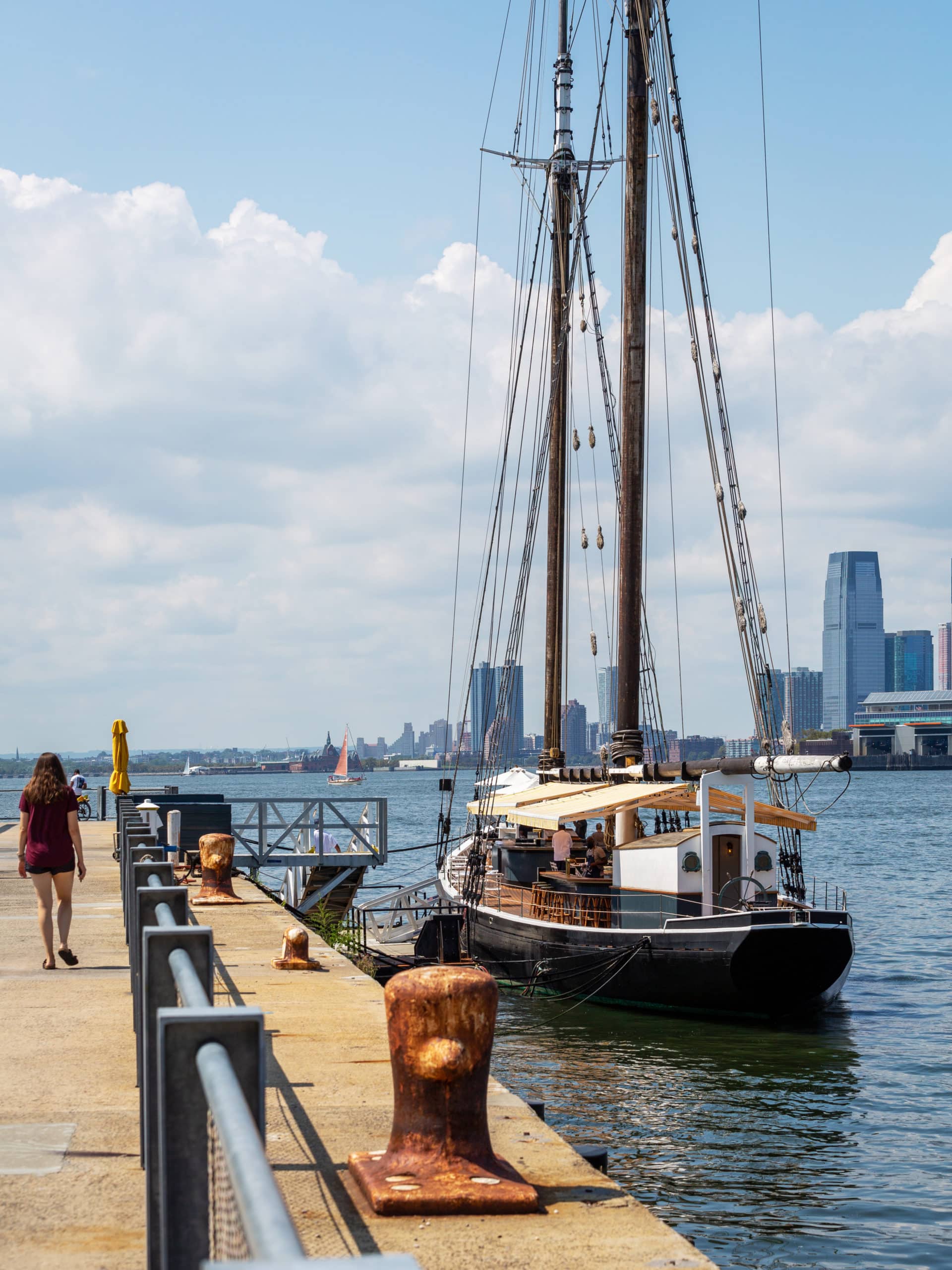 View from promenade of restaurant boat Pilot docked at Pier 6 on a sunny day.