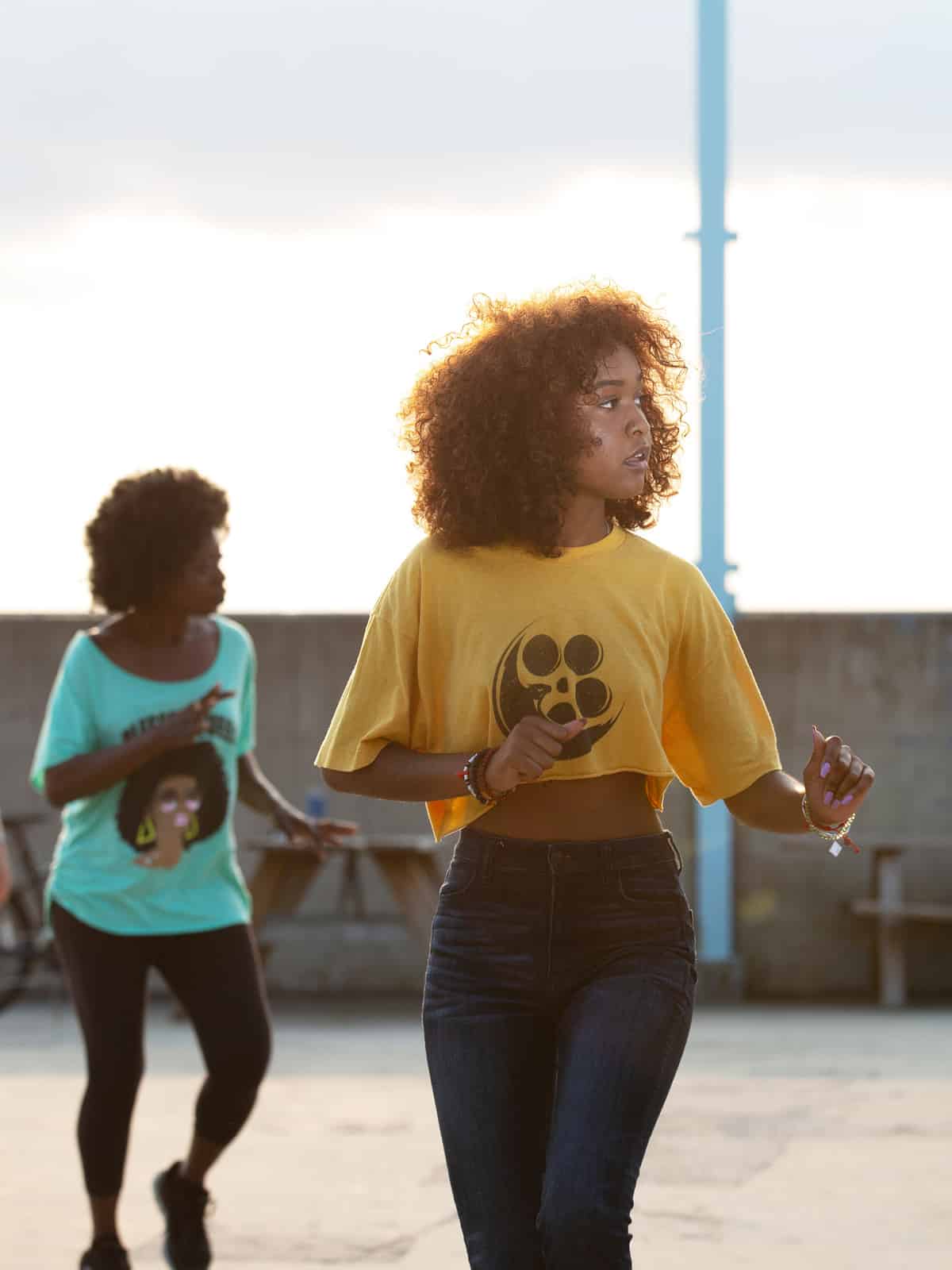 Woman learning salsa at sunset