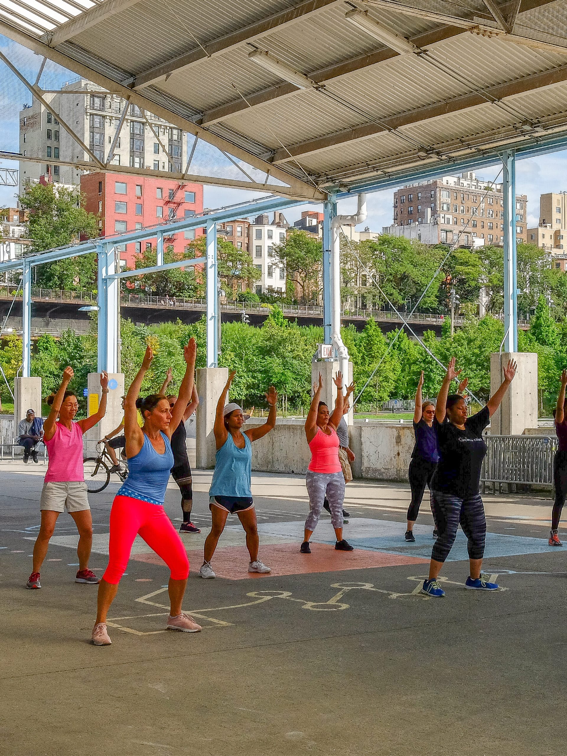 Group doing zumba under the Pier 2 canopy.